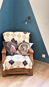 Appartements Au jardin de la Basilique : photos des chambres