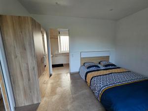 Maisons de vacances Gite a la campagne avec piscine interieure : photos des chambres
