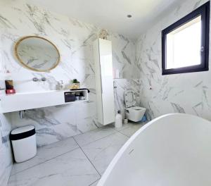 Villas Villa de standing avec piscine : photos des chambres