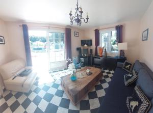 Maisons de vacances La Sirene Escapade en famille ou entre amis Maison lumineuse avec exterieur prive a 5 min de la plage Confort et convivialite assures : photos des chambres