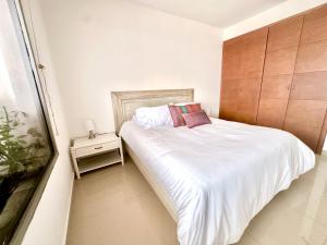 by Calamari Homes - Altamar 30B1 near walled city