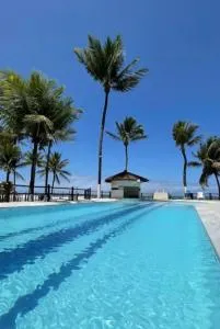 Duplex na praia - Pé na areia - 伊塔布纳