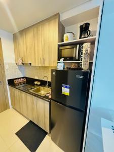 Amore Espacio Staycation -Coast Residences