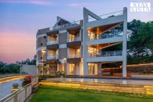 Mocha House with Indoor Pool, BBQ & Bonfire at Lonavala by StayVista