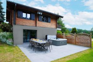 Chalets Petillant Chalet aux 3 etangs avec SPA, Sauna et Veranda : photos des chambres