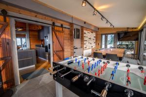 Chalets Petillant Chalet aux 3 etangs avec SPA, Sauna et Veranda : photos des chambres