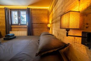 Chalets Petillant Chalet aux 3 etangs avec SPA, Sauna et Veranda : photos des chambres