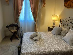 Brunello con veranda e piscina condivisa