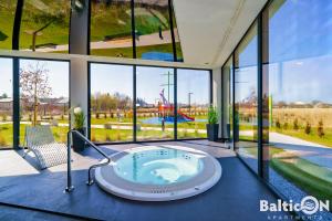 Apartamenty BalticON Westin House -luksusowy 70m2 , basen pool, sauna, parking inklusive