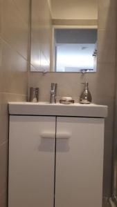 Appartements Magnifique petite maisonnette climatisee avec parking privatif : photos des chambres