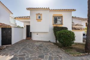 Casa con jardin privado