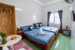 Phòng Bốn Người Có Phòng Tắm Riêng (Quadruple Room with Private Bathroom)