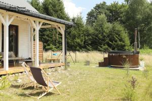 SzumiPuszcza - domki, sauna, balia