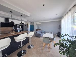 Appartements Gite l-olivier : photos des chambres