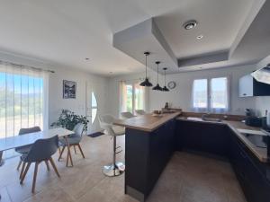 Appartements Gite l-olivier : photos des chambres