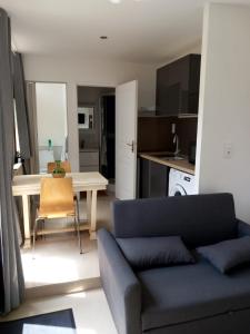 Appartements T2 rdc calme, ensoleille et fleurie : photos des chambres