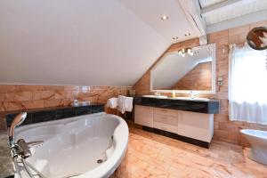 Maisons de vacances Manala - Maison avec Terrasse : photos des chambres