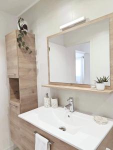 Appartements Parenthese entre Pic Saint Loup et Vignes - MEUBLE DE TOURISME 3 etoiles : photos des chambres