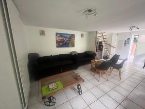 Maisons de vacances Entre ville & campagne (jardin avec riviere) : photos des chambres