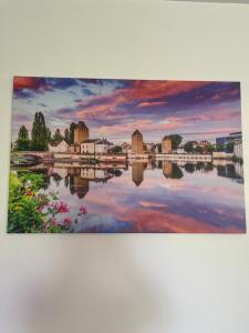 Maisons de vacances Entre ville & campagne (jardin avec riviere) : photos des chambres