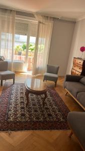 Sejours chez l'habitant Guillaume Cityscape : Appartement Suite