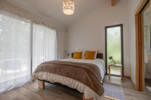 Maisons de vacances PAUSE NATURE. Maison Ananda a 14 kms de Toulouse avec parking privatif : photos des chambres