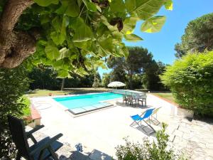 Villas L-echappee du Canal - Piscine - Cheminee - Clim - Parking prive gratuit - 8 personnes - 3 chambres - Parc : photos des chambres
