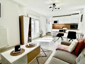 Appartements Le Cubry : Appart hyper-centre avec une place de parking : photos des chambres