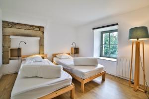 Maisons de vacances Ancienne Forge avec son jardin a 2 pas de la plage : photos des chambres