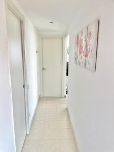 APARTAMENTO CON GARAJE en primera línea de playa