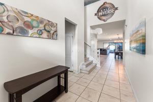 Epic 8BR Lakefront Pool Home Near Disney and Universal