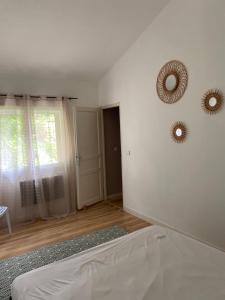 Appartements Maison de village avec terrasse : photos des chambres