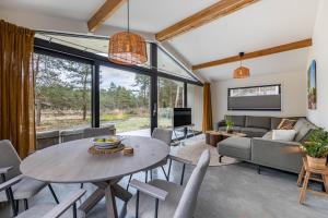 Design bungalow met wellness in parkbos