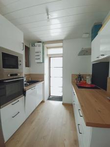 Maisons de vacances Maison chaleureuse et familiale idealement situee : photos des chambres