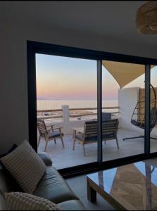 T2 vue sur le port jacuzzi terrasse et parking