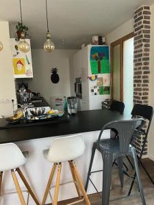 Appartements Duplex-pied du village JO paris : photos des chambres