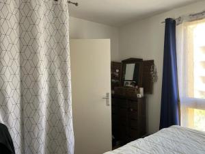 Appartements Duplex-pied du village JO paris : photos des chambres