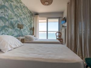 Appartement 3* face à la plage avec balcon et cuisine équipée - FR-1-197-587