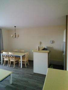 Appartements Appartement Les Sables Blancs : photos des chambres