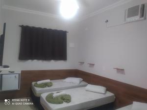 Pousada Quarto Aconchegante Suite com garagem perto da basílica