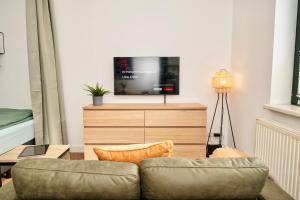 SudenburgNest - Studio-Apartment mit iPad, Boxspringbett, Smart-TV & Waschmaschine