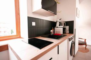 Appartements Studio 7 au coeur de la ville avec Parking : photos des chambres