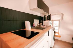 Appartements Studio 6 Centre Ville avec parking : photos des chambres