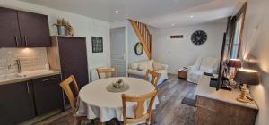 Appartements Gite avec piscine et bain nordique proche des plages du debarquement : photos des chambres