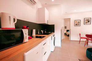 Appartements Appart 5 Charmant 2 pieces avec parking : photos des chambres