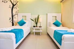 Holiday Suites Business District - formerly Empire Suites Hotel