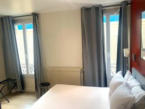 Hotels Hipotel Paris Belgrand Mairie du 20eme : photos des chambres