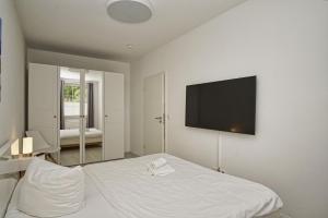 Ferienwohnung mit eigener Sauna und Terrasse- Haus Inselwind FeWo MEERfamilie