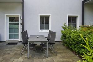 Ferienwohnung mit eigener Sauna und Terrasse- Haus Inselwind FeWo MEERfamilie