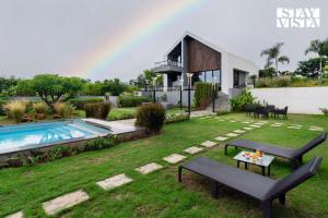 StayVista at The Rainfield Villa with Gazebo & Lawn